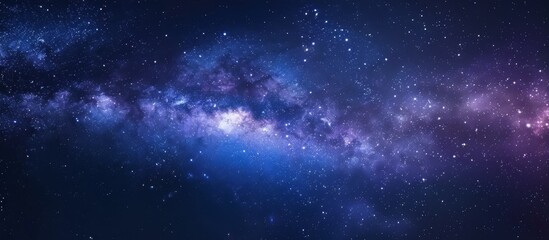 Wall Mural - An array of countless stars forming a mesmerizing galaxy in the night sky, a breathtaking view of the cosmic expanse