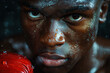 portrait of a black male boxer in red gloves in a boxing ring close-up