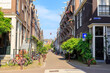Amsterdam, Netherlands - June 30, 2019: The historic city center of Amsterdam in the morning. Tweede Weteringdwarsstraat Street