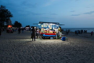 Kozhikode beach night view sunset in Kerala India. Food snacks stalls street food Kozhikode beach.