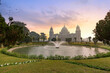 Victoria Memorial Kolkata with adjoing garden and pond at sunset.