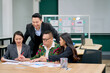 Marketing business team discuss and working together in meeting room for acheive target plan.