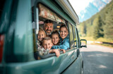 Fototapeta Desenie - Multi-generation family looking at camera outdoors at dusk, caravan holiday trip