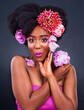 © peopleimages.com - Beauty, flowers and wow portrait of black woman in studio on dark background for natural cosmetics. Face, makeup or surprise and young afro model with protea in hair for aesthetic wellness at spa