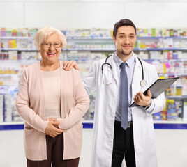 Sticker - Doctor holding an elderly female on the shoulder in a pharmacy