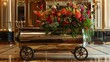 A gleaming chrome bell cart adorned with fresh flowers, ready for luggage transport.