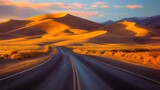 Fototapeta Niebo - A winding desert road stretching endlessly into the distance, flanked by towering sand dunes glowing golden in the afternoon sun. generative ai illustration.