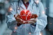 A compassionate doctor in a white coat presenting a digital glowing red heart with heartbeat ECG line