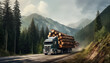 A truck transports felled trees in the mountains