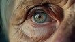 Wrinkles may be etched on the skin, but the sparkle in these eyes remains untarnished, a testament to the power of proper eye care