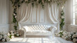 Lush Lounging: Serene White Sofa Surrounded by Elegant Floral Decor