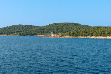 Canvas Print - Coastal landscape with Lighthouse Ražanj