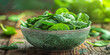 Fresh Organic Spinach Leaves in a Rustic Bowl on Wooden Background