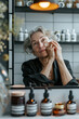 © shintartanya - Adult woman taking care of her facial skin in a light-colored bathroom.Natural organic cosmetics,organic cosmetics,eco drkjlbny,self-care,wellness,mental health,organic cosmetics testhetics.