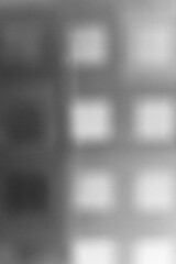 Wall Mural - background with squares in black and white film negative