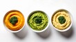 A trio of vibrant dips each crowned with a fresh broccoli floret