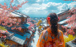 Woman in kimono standing on the stairs and looking at the beautiful view of Kyoto Japan