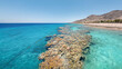 Underwater corals along empty beach on popular resort of Eilat on Red Sea in Israel.	