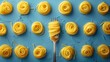 Fork Twirling Yellow Pasta on Blue Background