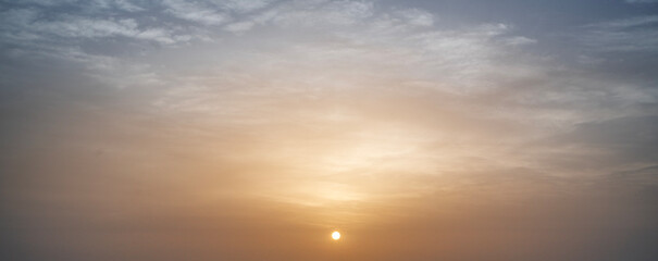 Wall Mural - Sunset in with dramatic storm clouds.