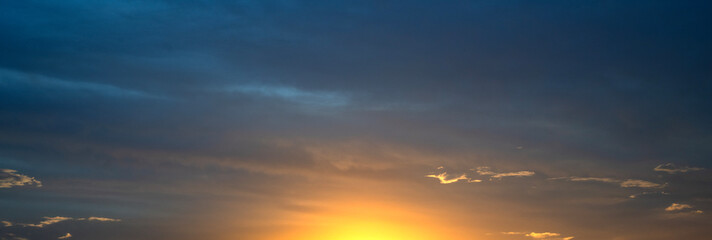 Wall Mural - Sunset in with dramatic storm clouds.