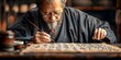 © Thares2020 - Master of Chinese Calligraphy Practicing the Centuries Old Craft with Precision and Focus