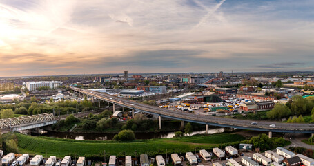 Wall Mural - Aerial view of Doncaster city centre with transport links at sunset