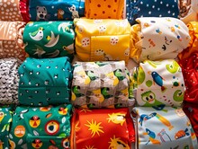 Cloth Diapers, A Collection Of Colorful Cloth Diapers With Ecofriendly Motifs