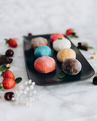 A popular Japanese dessert made from rice flour and cream filling - mochi