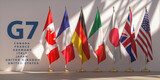 Fototapeta Boho - G7 summit or meeting concept. Row from flags of members of G7 group of seven and list of countries.