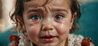 A face of a girl feeling discomfort or pain in stomach, sick child suffering constipation cramps.