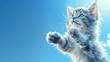   A painting of a kitten stretching up, paws outreached, to snatch a frisbee from the air