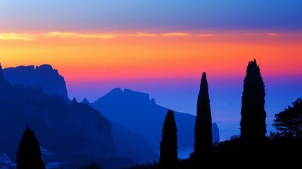 Wall Mural - Majestic Mountain Silhouette Against Vibrant Sunset Sky