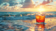 Cocktail on the beach at sunset, close up view of glass of summer refreshing drink on sand