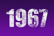 flat white grunge number of 1967 on purple background.