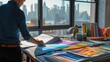 An interior designer is absorbed in evaluating various fabric samples spread across her studio table, with a backdrop of the cityscape outside. AIG41