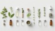 Homeopathy essentials, including glass vials of herbal extracts, medicinal herbs, mortar, pestle, and selection of homeopathic remedies, on a white backdrop. Flat lay. Alternative medicine