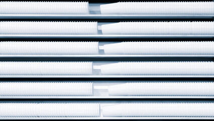 Fototapete - White plastic glasses in a row on a production line as an industrial concept background