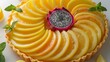   A tight shot of a fruit tart on a plate Oranges in slices and a kiwi halved accompany it