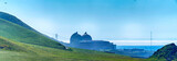 Fototapeta Kwiaty - Nuclear power plant with rolling green hills
