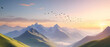 Panorama of Beautiful misty mountains with gentle slopes and flock of birds in sunrise sky