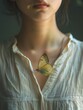 Fine art photography depicting a serene moment of a Thai woman in a modest white shirt, a butterfly perched delicately on her chest, in minimalism 