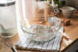 The decorative kitchen counter top with flour and baking utensil for home baking concept.