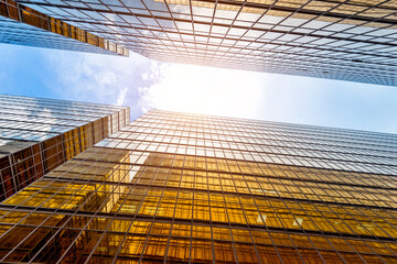 Wall Mural - Low angle view of modern office buildings in HongKong