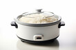 Modern electric rice cooker with ingredients on table in kitchen, closeup