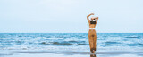 Fototapeta Miasto - Traveler asian woman relax and travel on beach in Thailand