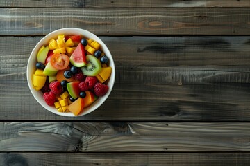 Aufkleber - Generative AI : Bowl of healthy fresh fruit salad on wooden background. Top view.
