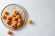 Generative AI : Board and plate with fresh apricots on white table
