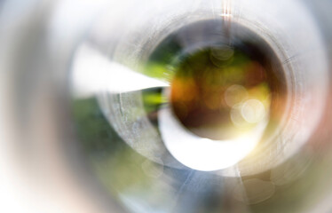 Canvas Print - Looking trees through steel pipes