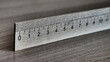 Close-up of a wooden centimeter ruler on a wooden table